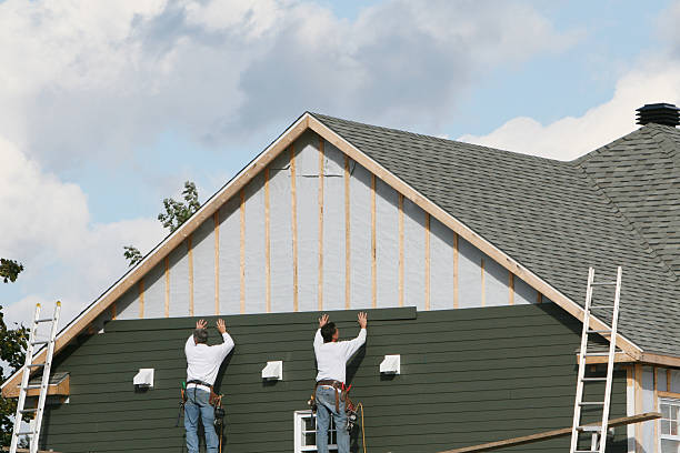 Professional Siding Installation technician working in Lykens, PA